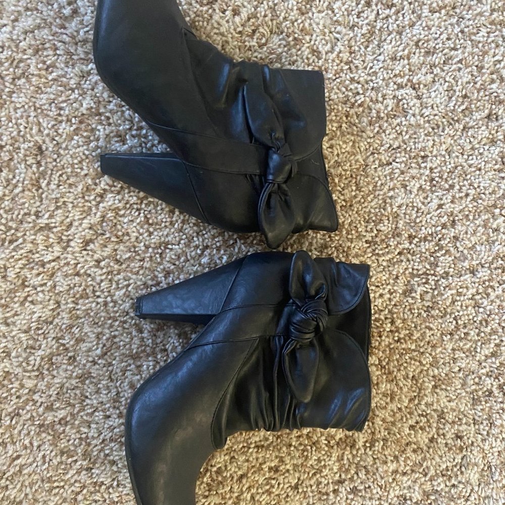 heeled black booties